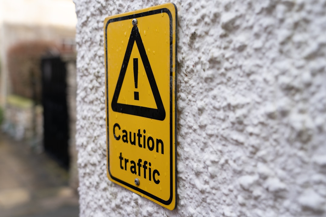 a caution traffic sign on the side of a building